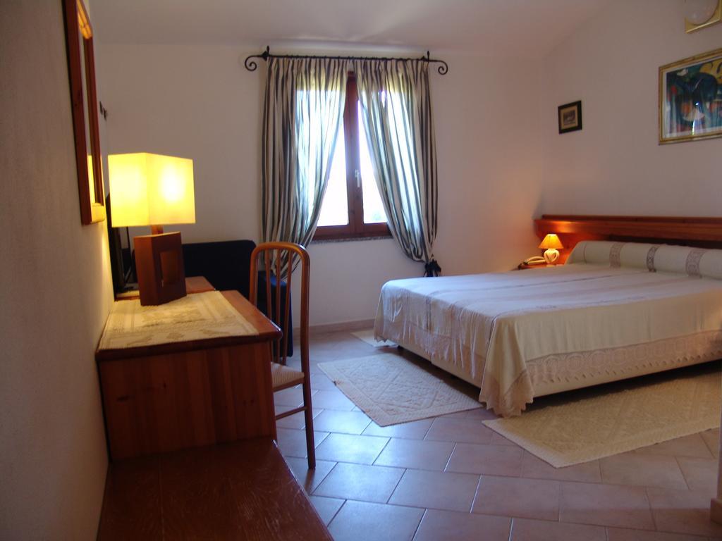 Hotel Il Gabbiano à Chia Chambre photo